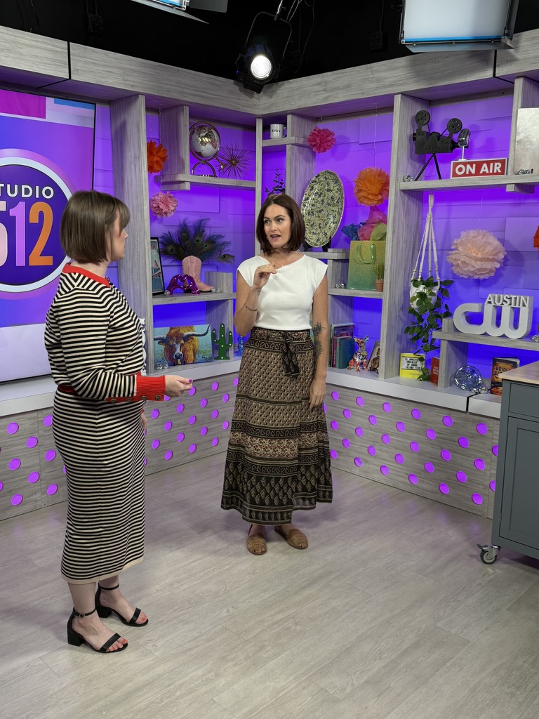 Kathryn Austin, LCSW, speaking on the Studio 512 television set in Austin, Texas